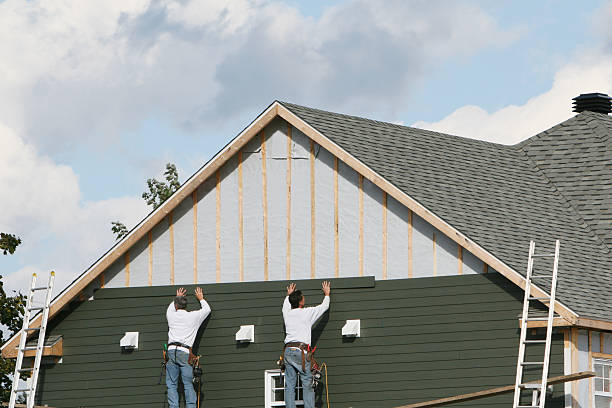 Professional Siding technician working in Cullen, VA